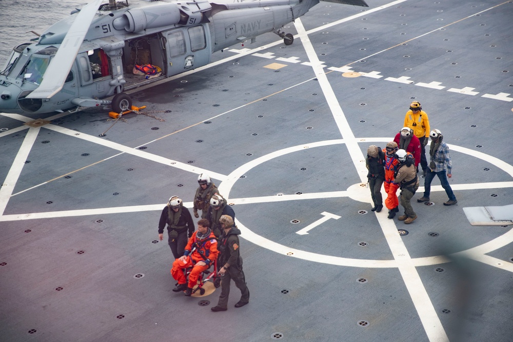 USS San Diego Sailors run medical drill with NASA astronauts while underway for NASA’s Underway Recovery Test 11