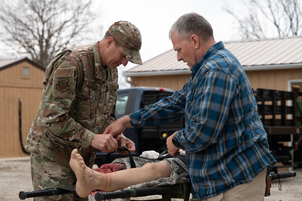 Maj. Gen. Martin Practices Tourniquet Application