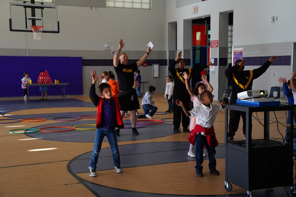 Fort Bliss Artillery Soldiers Bring Joy: A Day of Community Engagement at Sgt. Roberto Iduarte Elementary