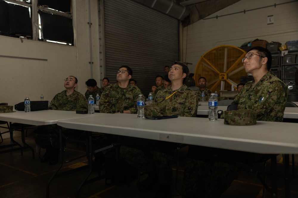 U.S. Navy Corpsman with 3rd Medical Battalion demonstrate a blood transfusion for the Japanese Ground Self Defense Force