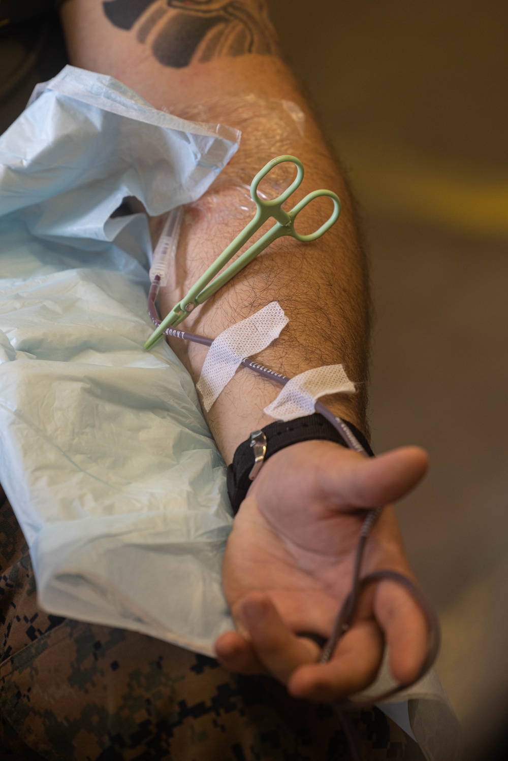 U.S. Navy Corpsman with 3rd Medical Battalion demonstrate a blood transfusion for the Japanese Ground Self Defense Force