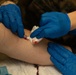 U.S. Navy Corpsman with 3rd Medical Battalion demonstrate a blood transfusion for the Japanese Ground Self Defense Force