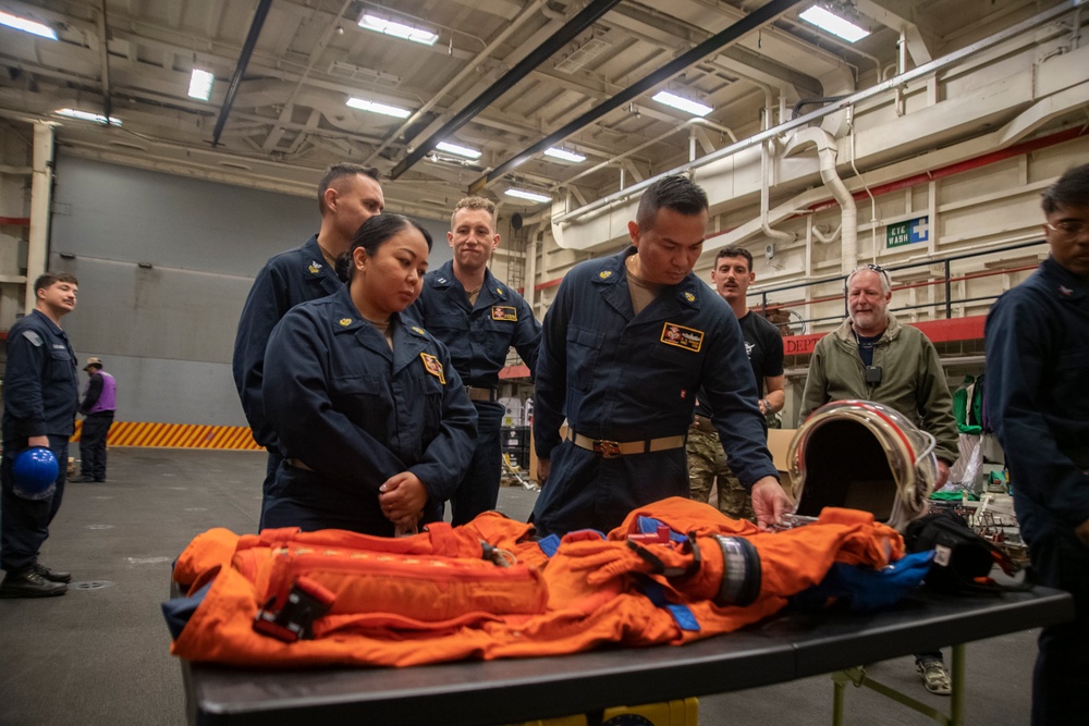 USS San Diego Orion crew survival suit presentation