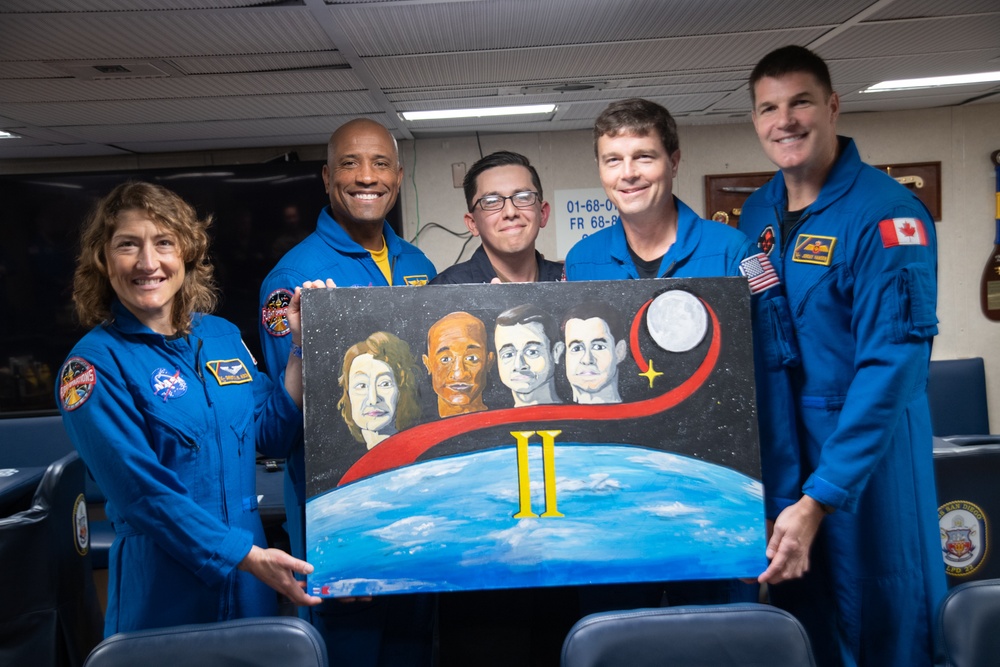 USS San Diego Sailor paints portraits of Artemis II astronauts during Underway Recovery Test 11