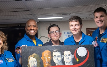 USS San Diego Sailor paints portraits of Artemis II astronauts during Underway Recovery Test 11