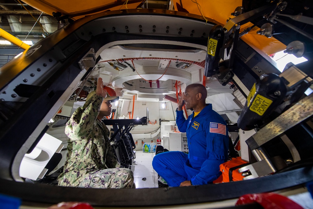 USS San Diego Sailor reenlisted by NASA astronaut during URT-11