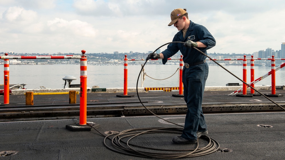 Sailor does maintenance aboard USS Carl Vinson (CVN 70)