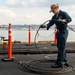 Sailor does maintenance aboard USS Carl Vinson (CVN 70)