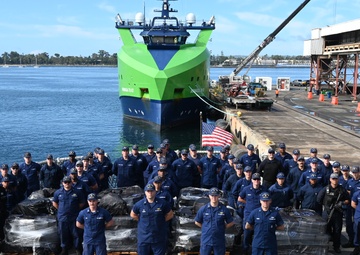 Coast Guard Cutter Alert crewmembers pose for a group photo during a drug offload in San Diego