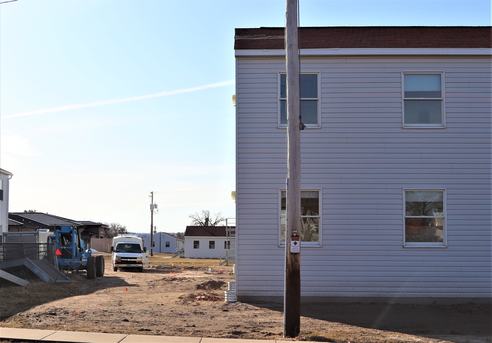 Reset of World War II-era barracks moved in 2023 continues; work nearly complete