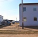 Reset of World War II-era barracks moved in 2023 continues; work nearly complete