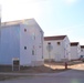 Reset of World War II-era barracks moved in 2023 continues; work nearly complete