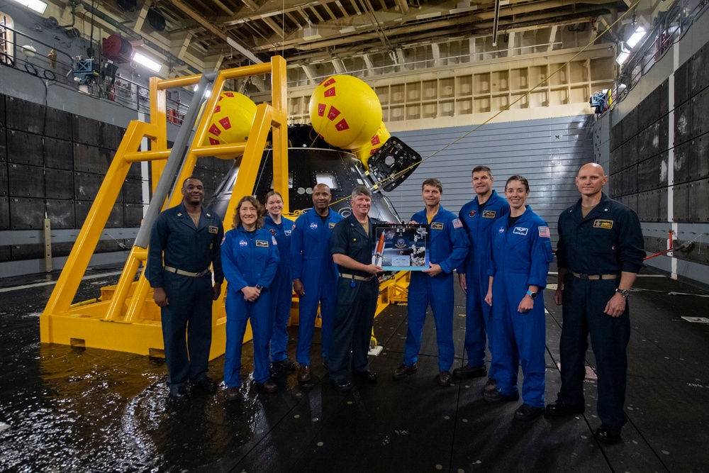 USS San Diego leadership poses with astronauts during Underway Recovery Test 11