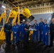 USS San Diego leadership poses with astronauts during Underway Recovery Test 11