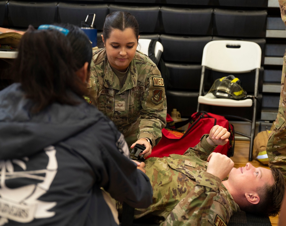 Airmen showcase military career fields at health fair
