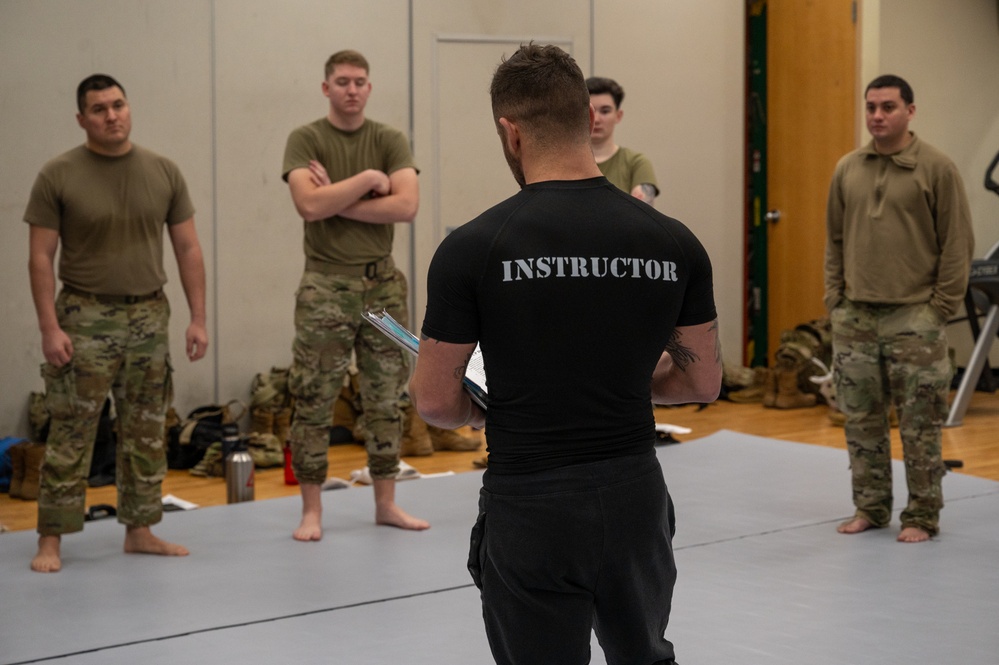 Osan Airmen enhance readiness through combatives certification