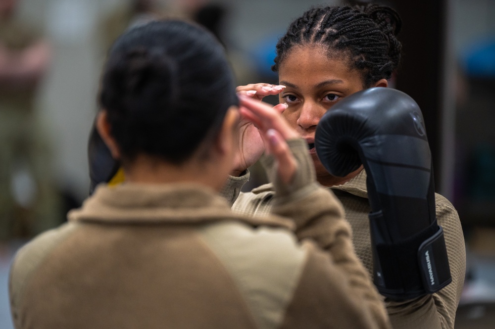 Osan Airmen enhance readiness through combatives certification