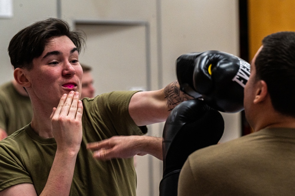 Osan Airmen enhance readiness through combatives certification