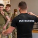 Osan Airmen enhance readiness through combatives certification