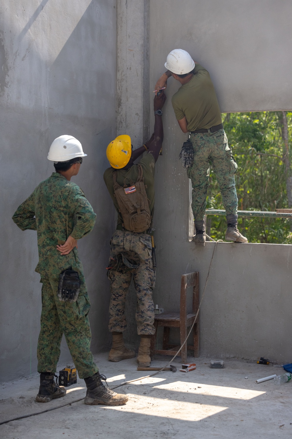 Cobra Gold 24; Marines with Marine Wing Support Squadron 171 begin electrical work at the Ban Prakaet School