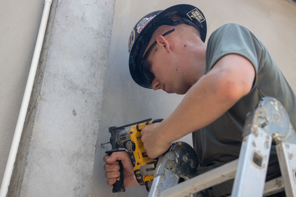 Cobra Gold 24; Marines with Marine Wing Support Squadron 171 begin electrical work at the Ban Prakaet School