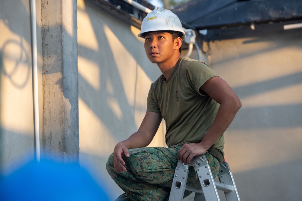 Cobra Gold 24; Marines with Marine Wing Support Squadron 171 begin electrical work at the Ban Prakaet School