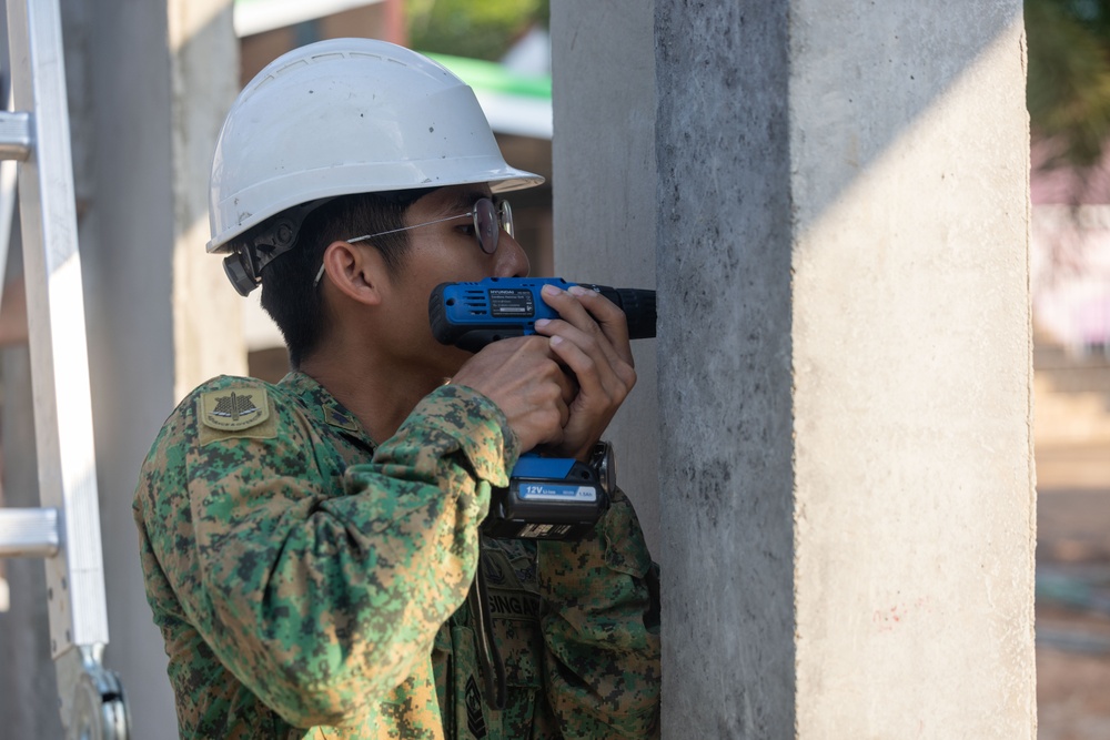 Cobra Gold 24; Marines with Marine Wing Support Squadron 171 begin electrical work at the Ban Prakaet School