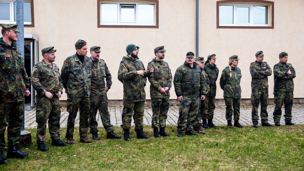 Bundeswehr Medical Academy soldiers practice basic operations of U.S. Army weapons