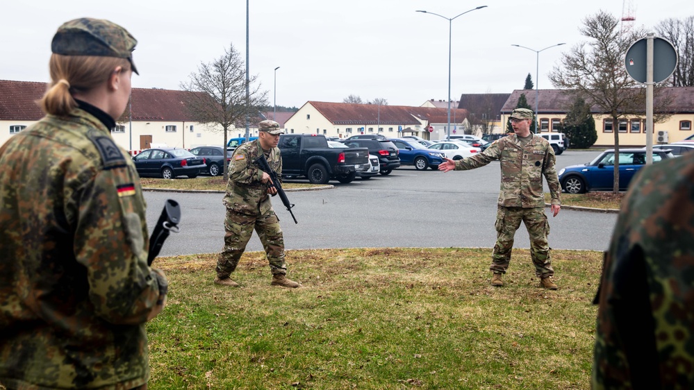 Bundeswehr Medical Academy soldiers practice basic operations of U.S. Army weapons