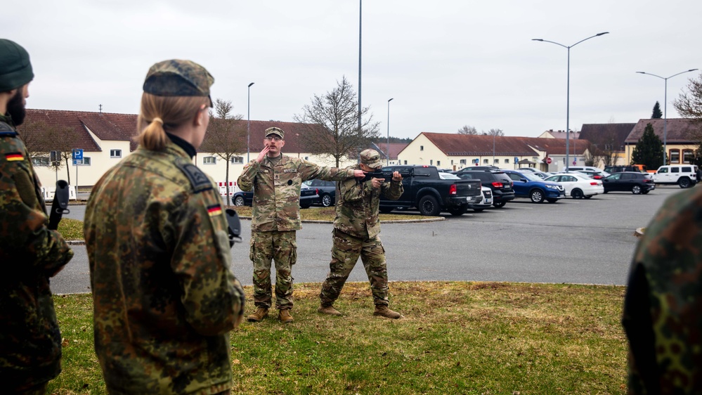 Bundeswehr Medical Academy soldiers practice basic operations of U.S. Army weapons