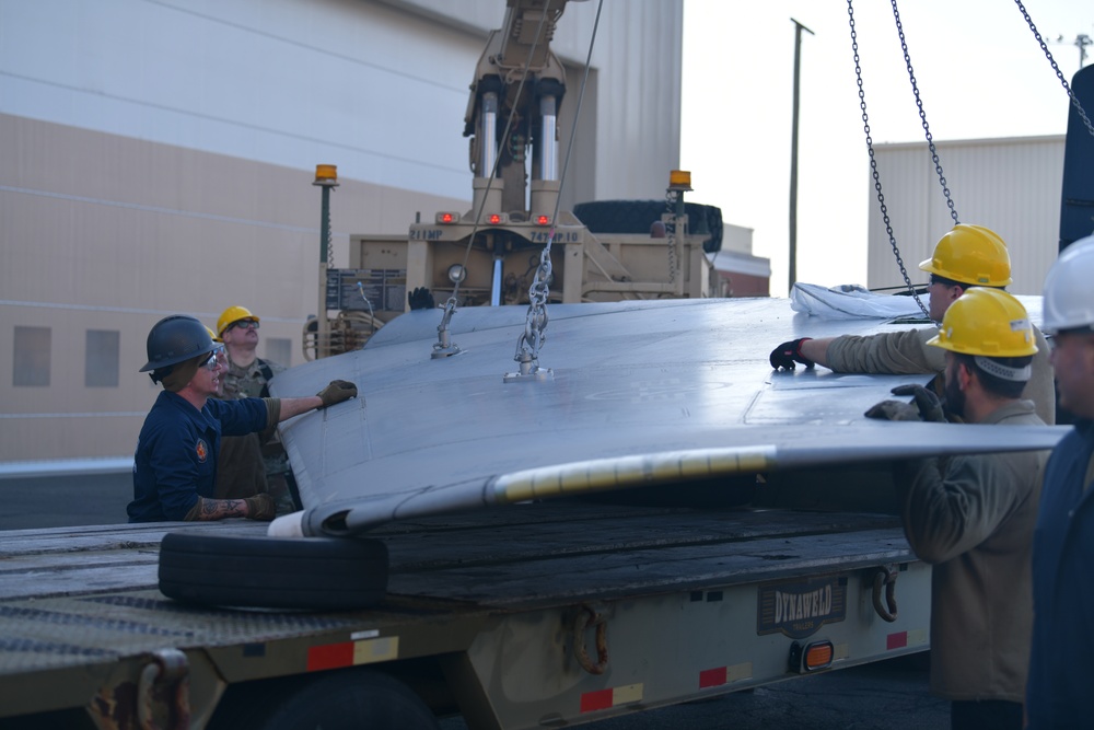 Depot team removes F-15 wing as 104FW prepares for conversion