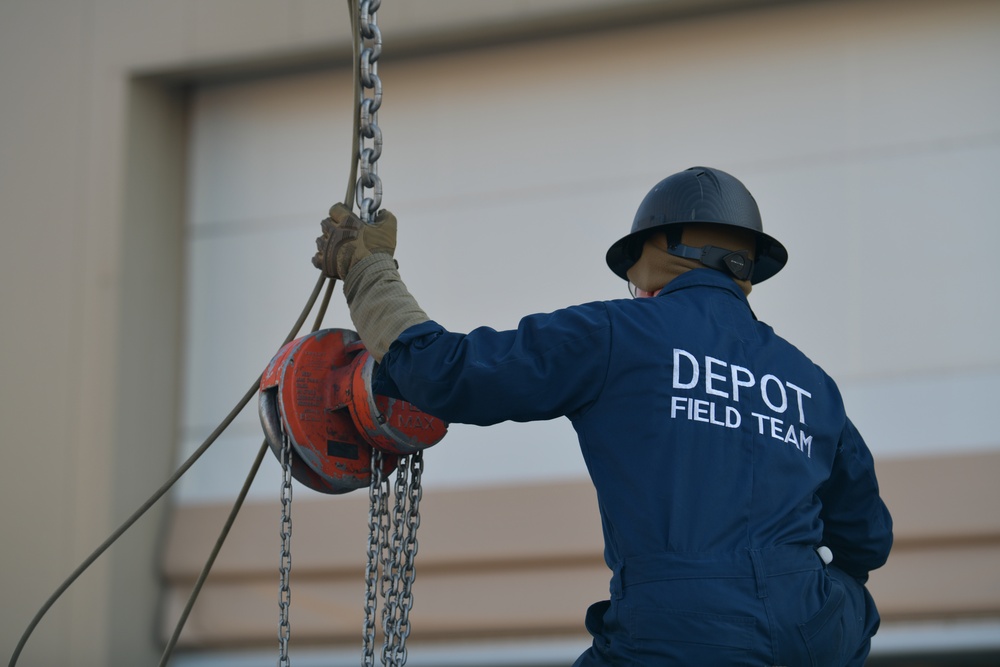 Depot team removes F-15 wing as 104FW prepares for conversion