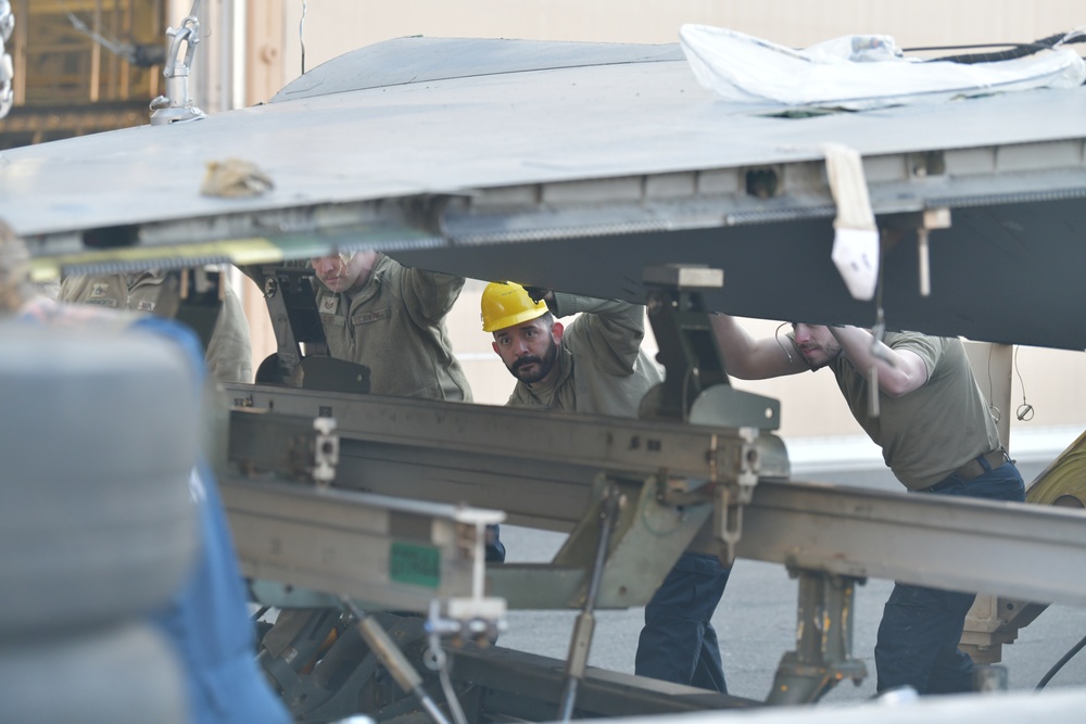Depot team removes F-15 wing as 104FW prepares for conversion