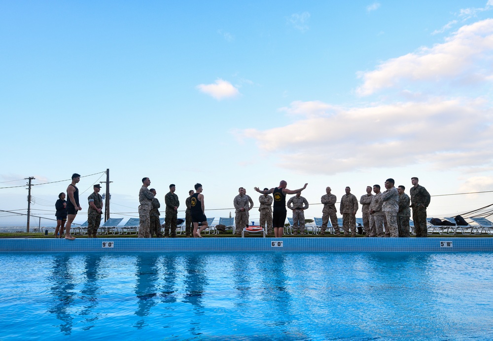 MARFORPAC personnel conduct water survival training