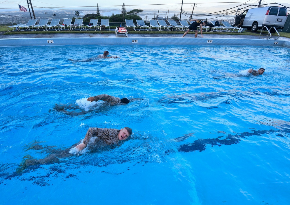 MARFORPAC personnel conduct water survival training