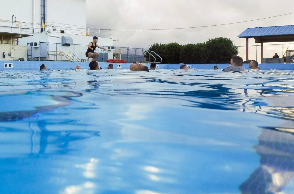 MARFORPAC personnel conduct water survival training