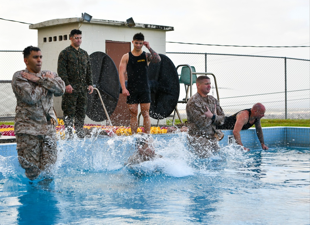 MARFORPAC personnel conduct water survival training