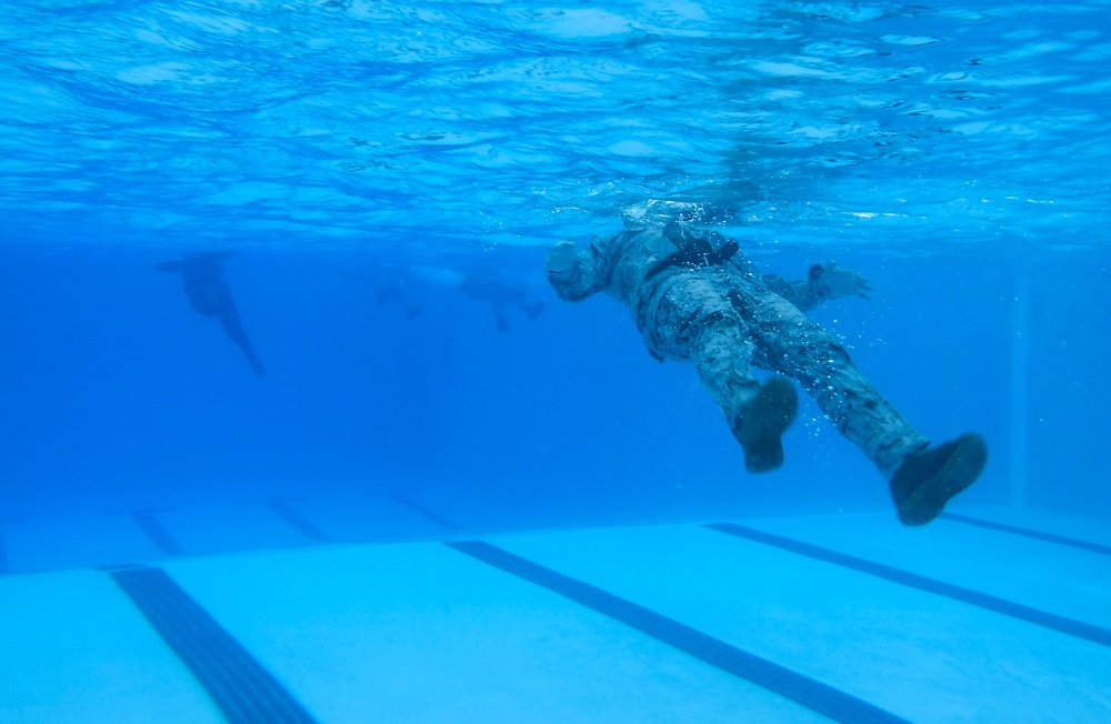 MARFORPAC personnel conduct water survival training