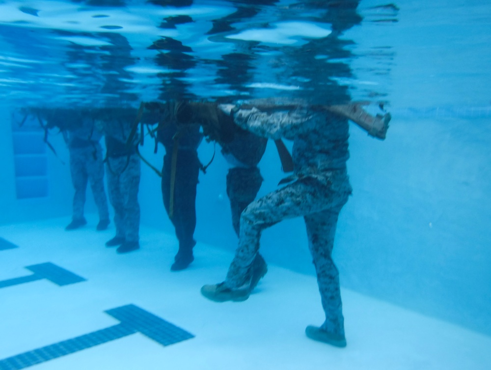 MARFORPAC personnel conduct water survival training