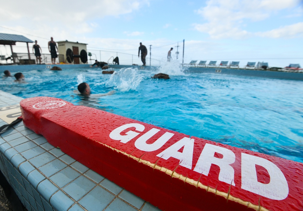 MARFORPAC personnel conduct water survival training