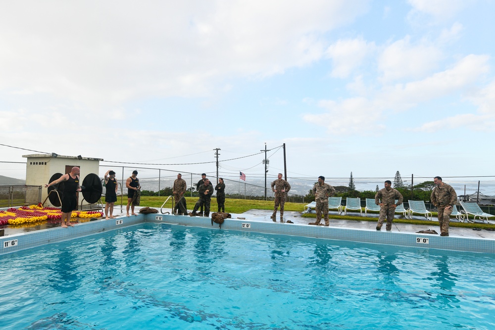 MARFORPAC personnel conduct water survival training