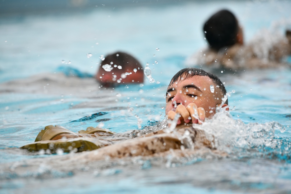 MARFORPAC personnel conduct water survival training