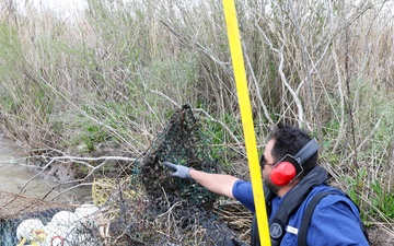 Wallisville Park staff cleans up abandoned crab traps