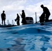 MARFORPAC personnel conduct water survival training