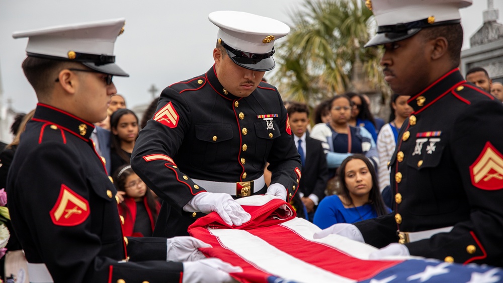 U.S. Marines pay proper respects to a fallen brother