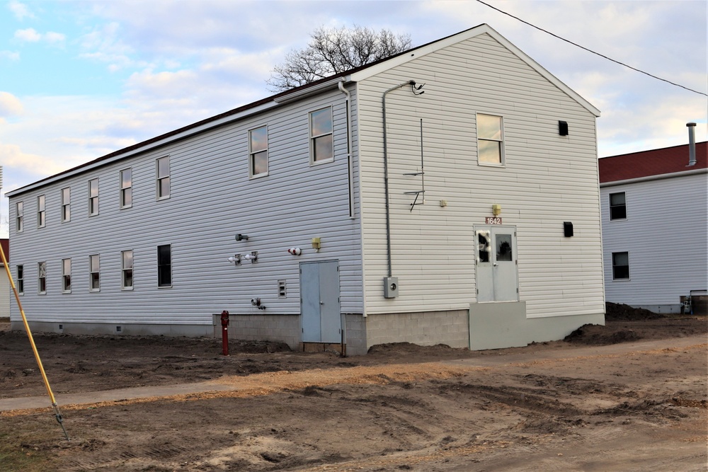 Reset of World War II-era barracks moved in 2023 continues; work nearly complete