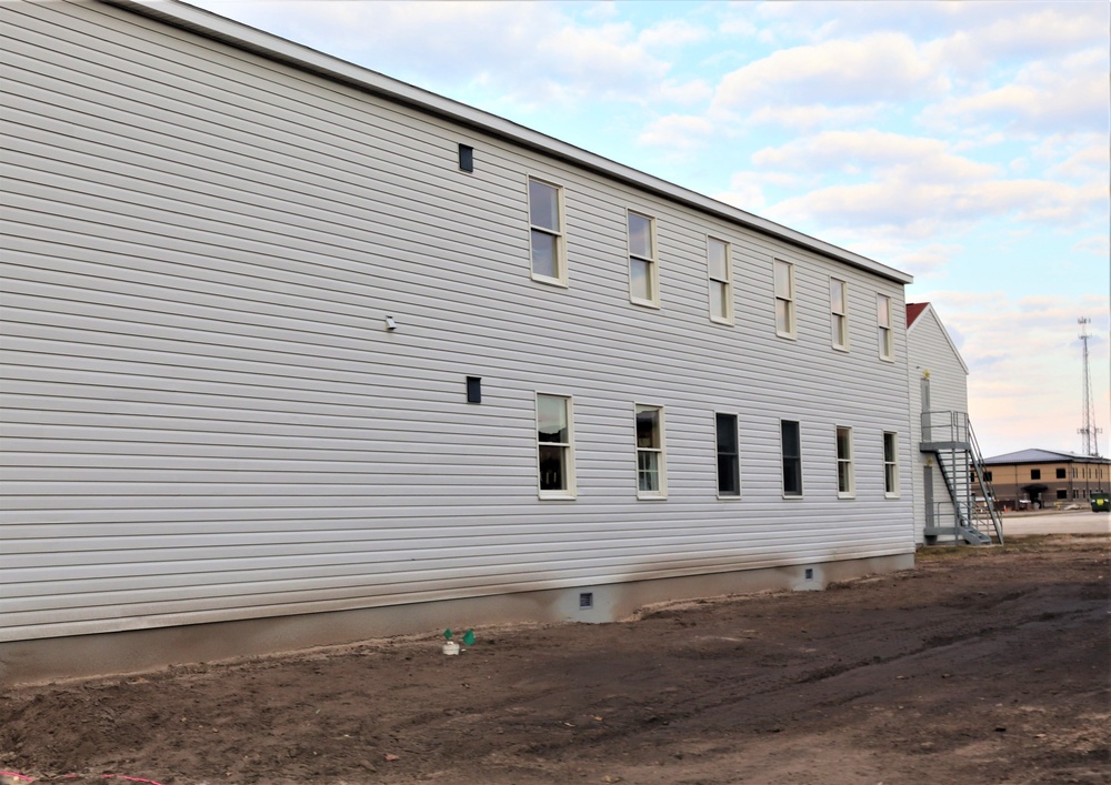 Reset of World War II-era barracks moved in 2023 continues; work nearly complete