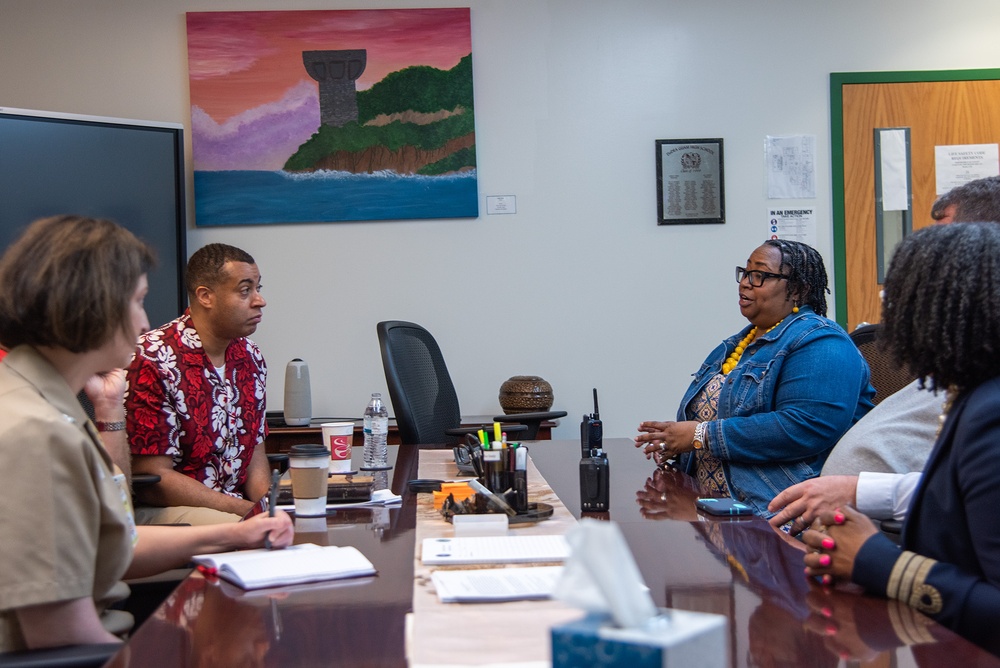 Honorable Franklin R. Parker, assistant Secretary of the Navy for Manpower and Reserve Affairs, toured Guam High school while visiting Guam