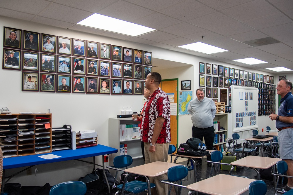 Honorable Franklin R. Parker, assistant Secretary of the Navy for Manpower and Reserve Affairs, toured Guam High school while visiting Guam