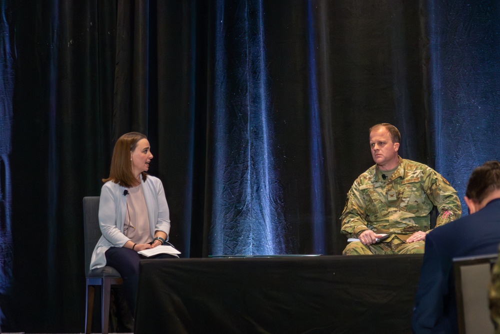 CDAO's Jennifer Hay moderates a breakout session, shown beside panel member Col. Gary Floyd